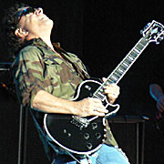 Neal Schon playing guitar image